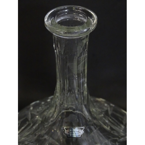 303 - A large quantity of cut glass / crystal glassware to include champagne flutes,  assorted drinking gl... 