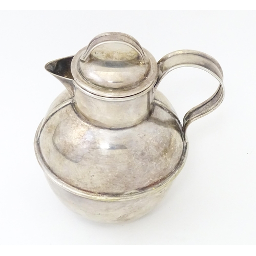 510 - A silver plate cream / milk jug modelled as a channel island / Guernsey cream pot. Approx 5