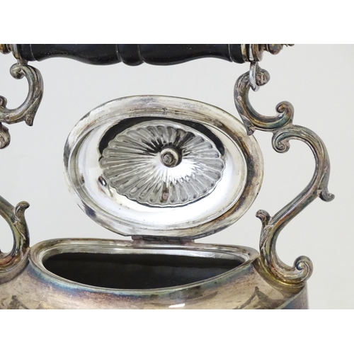 602 - A late 19th / early 20thC silver plate spirit kettle on stand with burner under. Approx. 13