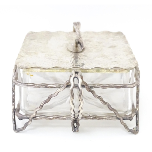 603 - A glass and silver plate butter dish with  textured detail and naturalistic formed handle. Maker Huk... 