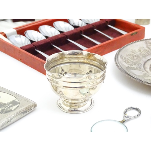 608 - A quantity of assorted silver plated wares to include cigarette box, wine funnels, spoons, ash tray ... 