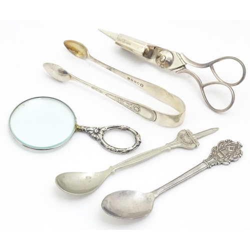 608 - A quantity of assorted silver plated wares to include cigarette box, wine funnels, spoons, ash tray ... 