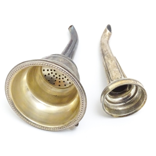 608 - A quantity of assorted silver plated wares to include cigarette box, wine funnels, spoons, ash tray ... 