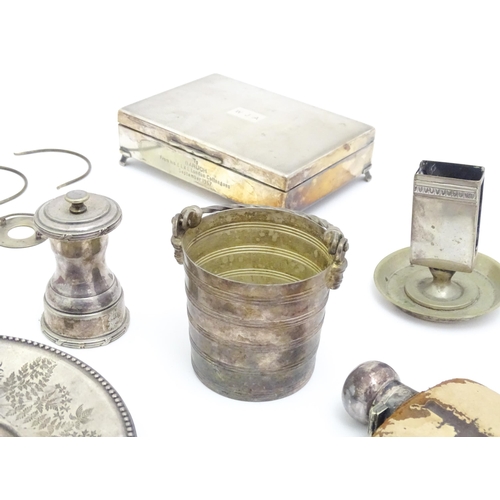 608 - A quantity of assorted silver plated wares to include cigarette box, wine funnels, spoons, ash tray ... 