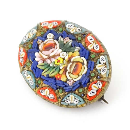 747 - An Italian brooch with micro mosaic detail. Approx 2