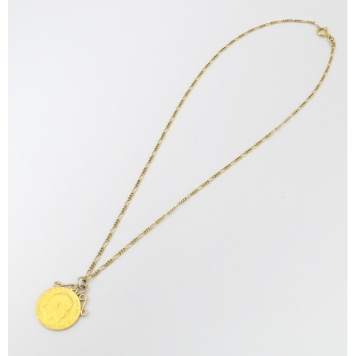 801 - A 1910 half sovereign coin with pendant mount to top, on a 9ct gold chain. Chain approx. 18