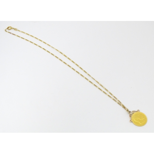 801 - A 1910 half sovereign coin with pendant mount to top, on a 9ct gold chain. Chain approx. 18