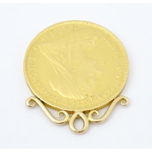 802 - A pendant formed as a Victorian 2 pound / double sovereign with hanging mount to top. Approx 1 1/4