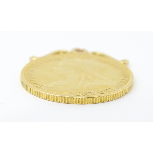 802 - A pendant formed as a Victorian 2 pound / double sovereign with hanging mount to top. Approx 1 1/4