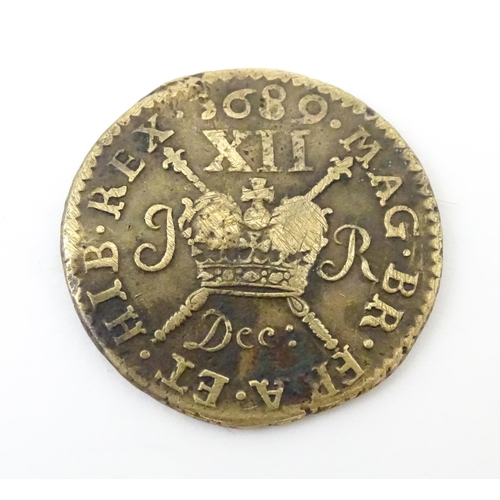 806 - Coins: A James II 1689 Irish Gun Money shilling together with A quantity of George VI two shilling c... 