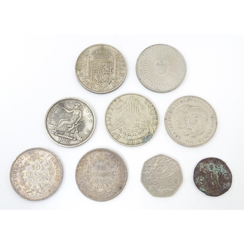 808 - Nine assorted coins / commemorative / restruck coins to include an old bronze coin the reverse with ... 