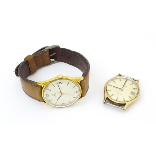 815 - A Gentleman's Tissot automatic wrist watch together with an Omega watch case and movement. each appr... 