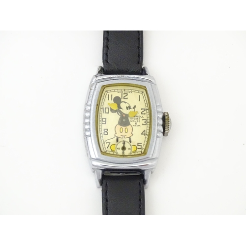 829 - Five assorted vintage novelty watches,  the dials decorated with Mikey Mouse, Terry Tell Time, Dick ... 