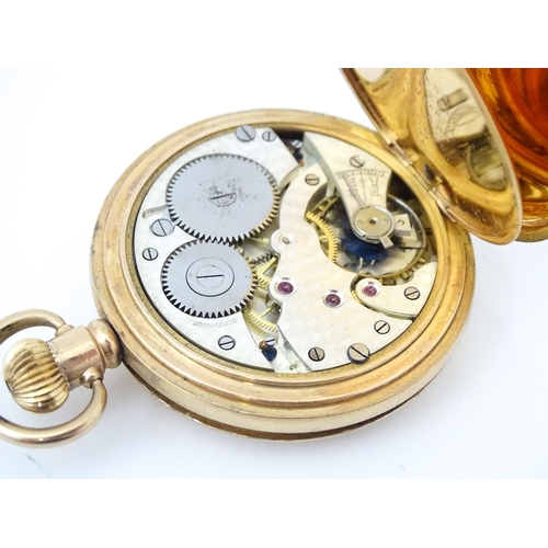 833 - A gold plated Hunter cased pocket watch, the case marked Dennison Watch Case Co. and 'Star' . Togeth... 