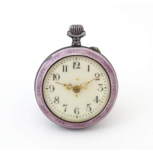 840 - A Continental white metal fob watch with purple guilloche enamel decoration and scene to reverse dep... 