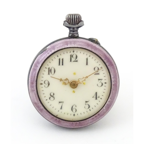 840 - A Continental white metal fob watch with purple guilloche enamel decoration and scene to reverse dep... 