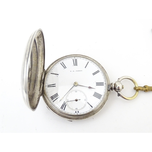 843 - A Bravingtons fob watch, together with a pair cased pocket watch, the dial signed T. A. Jones, a hal... 