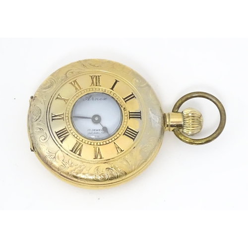 843 - A Bravingtons fob watch, together with a pair cased pocket watch, the dial signed T. A. Jones, a hal... 