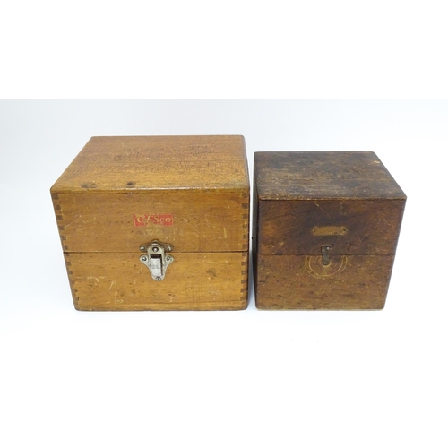 851 - Watchmakers / Repairers Equipment : Two cased watchmaker's staking tools / punches. One marked Ges C... 