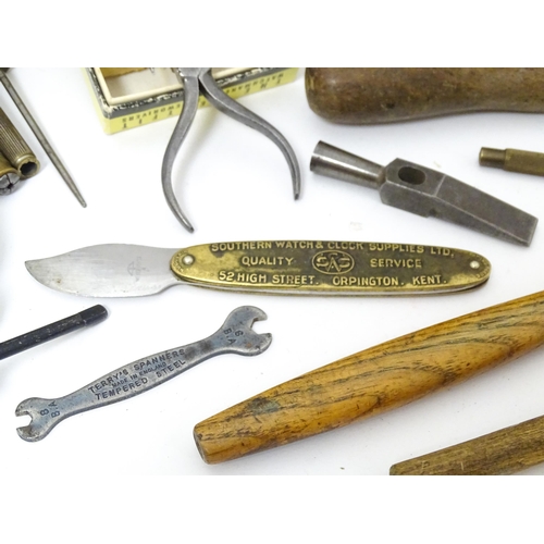 852 - A quantity of clock / watchmakers tools etc. to include gauges, pliers, clamps, files, etc., a knife... 