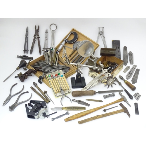 852 - A quantity of clock / watchmakers tools etc. to include gauges, pliers, clamps, files, etc., a knife... 