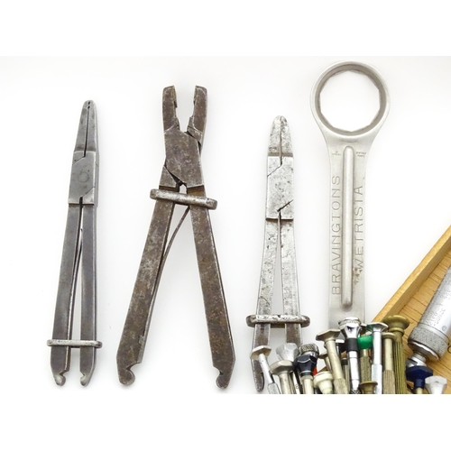 852 - A quantity of clock / watchmakers tools etc. to include gauges, pliers, clamps, files, etc., a knife... 