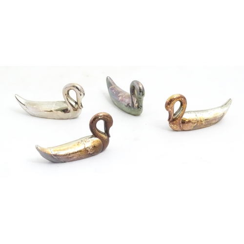 1199 - Four silver plate novelty menu / place card holders modelled as swans. Approx. 2 1/4