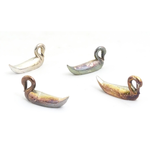 1199 - Four silver plate novelty menu / place card holders modelled as swans. Approx. 2 1/4