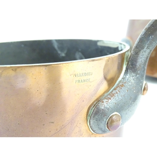 1203 - Two French Villedieu copper pans and lids with iron handles. Stamped to side. Largest approx. 14 1/2... 