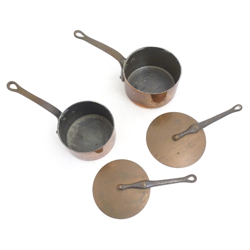 1203 - Two French Villedieu copper pans and lids with iron handles. Stamped to side. Largest approx. 14 1/2... 