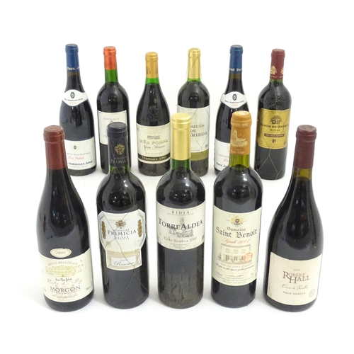 1206 - Eleven bottles of red wine, to include Torre Aldea Rioja 2000, Domaine Saint Benoit Syrah 2007, Morg... 