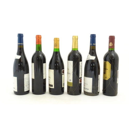 1206 - Eleven bottles of red wine, to include Torre Aldea Rioja 2000, Domaine Saint Benoit Syrah 2007, Morg... 