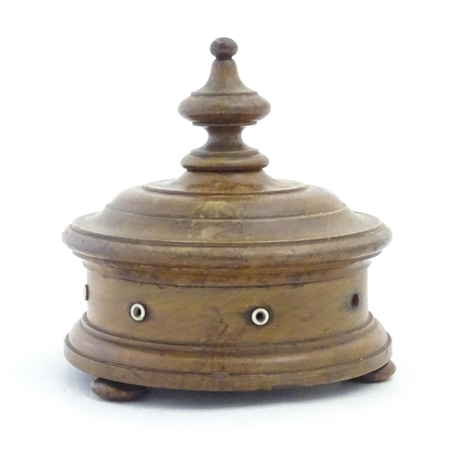 1215 - Sewing Interest: A Victorian Welsh turned walnut / treen thread box of circular form raised on three... 