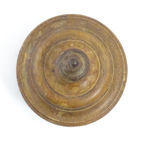 1215 - Sewing Interest: A Victorian Welsh turned walnut / treen thread box of circular form raised on three... 