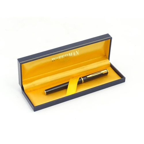 1221 - A cased Waterman 'Ideal' fountain pen, measuring  5 1/2