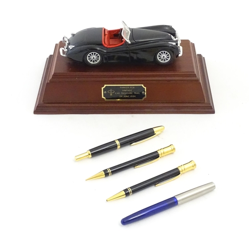 1224 - A Parker Pen Vintage Car Treasure Trail trophy, inscribed 24 June 1994. Together with Parker ballpoi... 