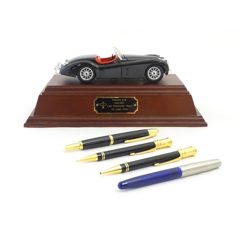 1224 - A Parker Pen Vintage Car Treasure Trail trophy, inscribed 24 June 1994. Together with Parker ballpoi... 