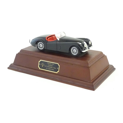 1224 - A Parker Pen Vintage Car Treasure Trail trophy, inscribed 24 June 1994. Together with Parker ballpoi... 