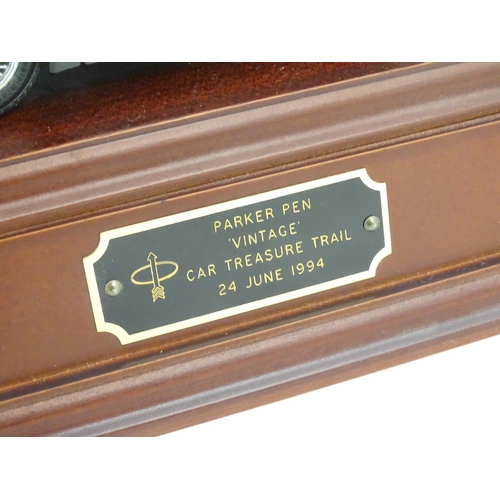 1224 - A Parker Pen Vintage Car Treasure Trail trophy, inscribed 24 June 1994. Together with Parker ballpoi... 