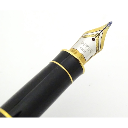 1227 - A Parker Sonnet fountain pen with 18K gold nib, c2004, together with a matching Parker Sonnet ballpo... 