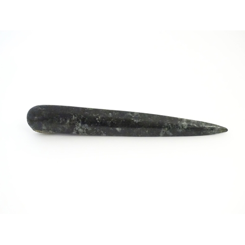 1231 - A 20thC novelty serpentine hardstone paperknife / letter opener / page turner surmounted by a model ... 