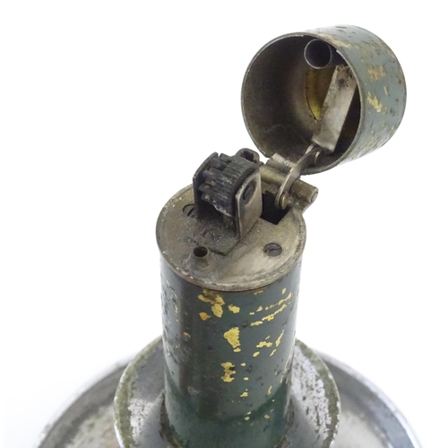 1234 - A 20thC novelty cigarette lighter modelled as a chamberstick. Approx. 5 3/4