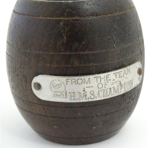 1238 - Two 20thC treen items, comprising a carved vesta / snuff pot modelled as a pair of boots, and pot of... 