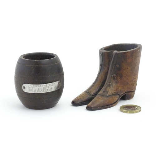 1238 - Two 20thC treen items, comprising a carved vesta / snuff pot modelled as a pair of boots, and pot of... 