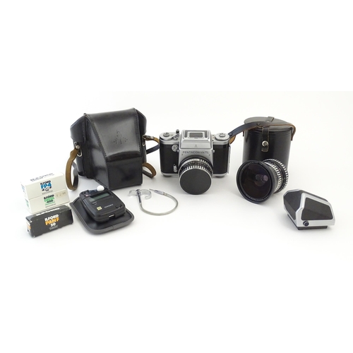 1244 - A Pentacon Six TL camera with two Carl Zeiss Jena lenses - 2.8/80 biometar and 4/50 Flektagon (cased... 