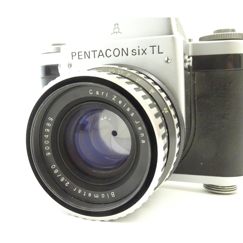 1244 - A Pentacon Six TL camera with two Carl Zeiss Jena lenses - 2.8/80 biometar and 4/50 Flektagon (cased... 