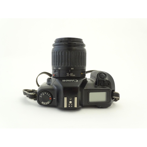 1245 - A Canon EOS 1000 camera with a 35-80mm f/4-5.6 lens.