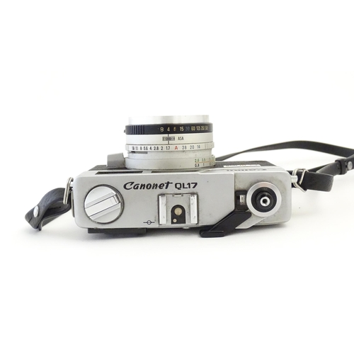 1247 - A Canon Canonet G-III QL17 35mm film camera, c1972, cased with lens cap. Approx 4 5/8