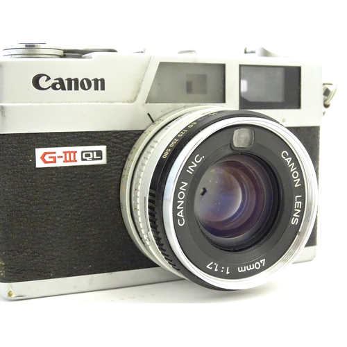 1247 - A Canon Canonet G-III QL17 35mm film camera, c1972, cased with lens cap. Approx 4 5/8