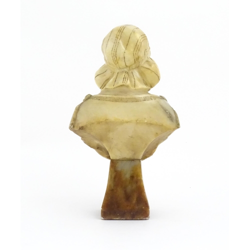 1263 - An early 20thC two-tone alabaster bust of a young woman with engraved detail. Approx. 11 3/4